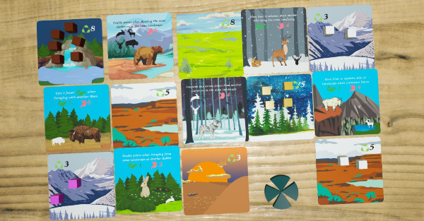 A tableau of herbivores and carnivores in a variety of landscapes