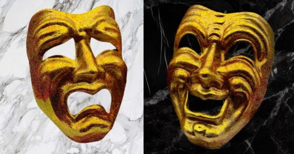 Gold comedy and tragedy masks on a background of black and white marble.