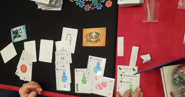 Potion and Flower cards on a table