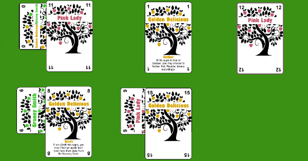 Apple tree cards of different varieties on the table in a 3x3 grid pattern