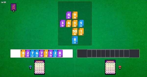 A card game prototype displaying cards laid out in a 5x5 grid on a green felt background.